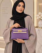 حقيبة نسائية ميني من جلد النعام الطبيعي بقفل معدني