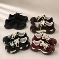 حذاء رياضي نسائي من الجلد بنعل سميك وزيادة طول مخفية