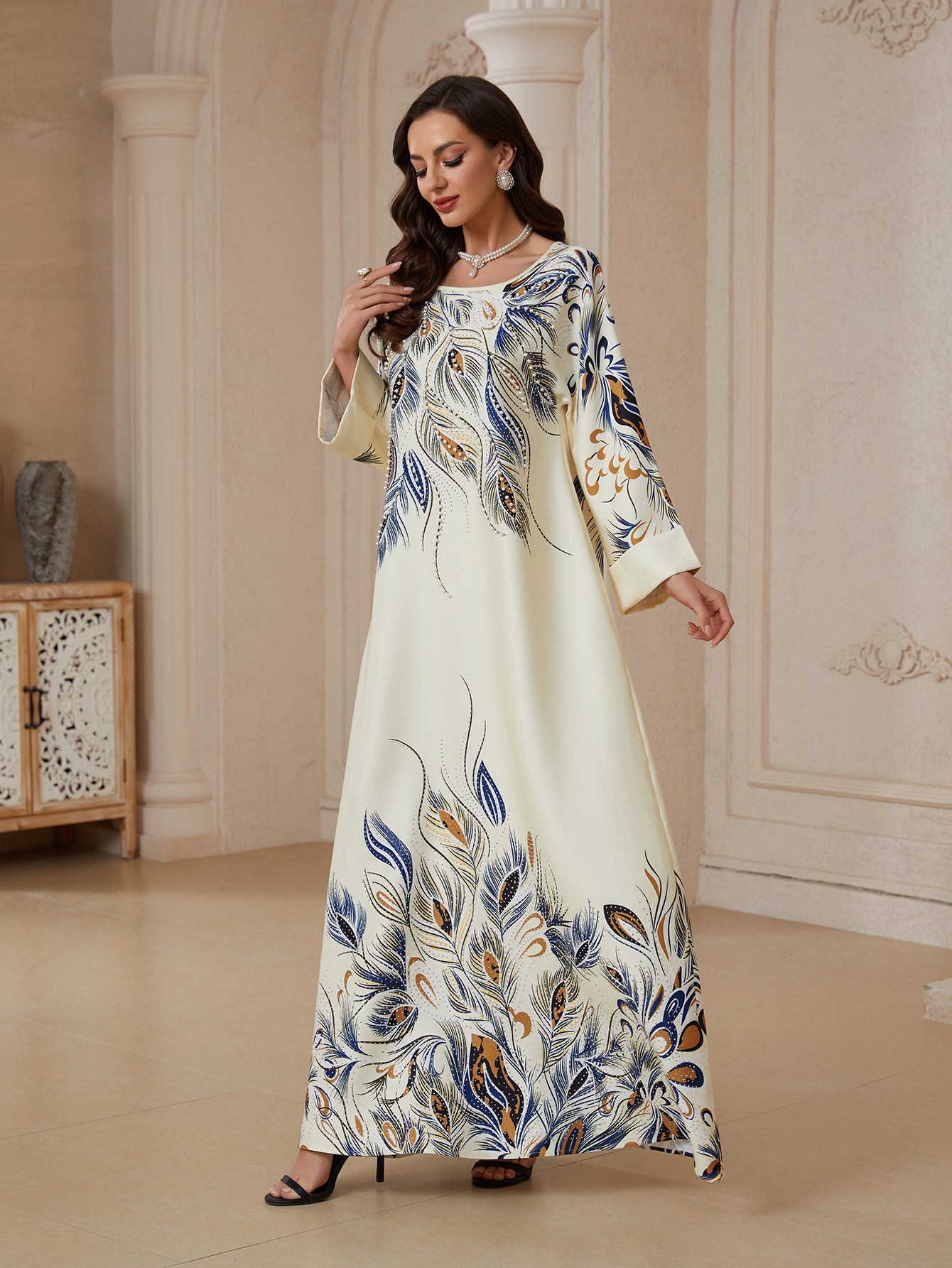 فستان نسائي طويل مطبوع مزين بالخرز والفصوص – أصفر فاتح