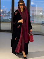 عباية نسائية طويلة بطبعات أنيقة