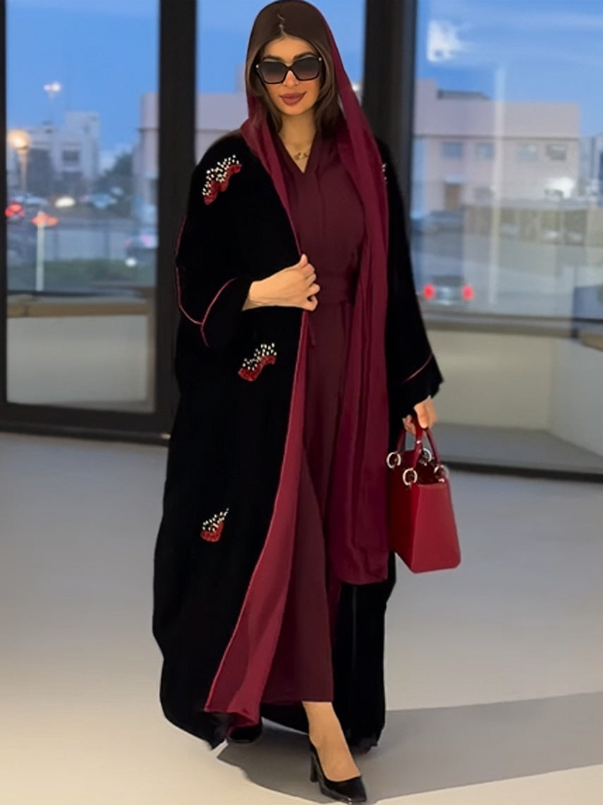 عباية نسائية طويلة بطبعات أنيقة